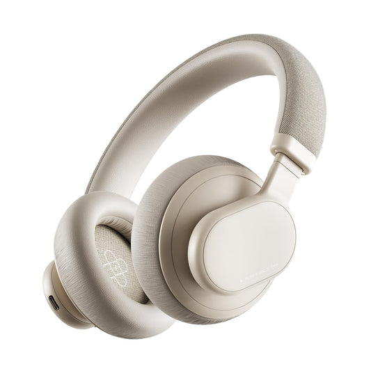 Beige over-ear wireless headphones with a padded headband and cushioned ear cups, shown on a plain white background.