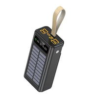 Black solar power bank with digital display on a white background