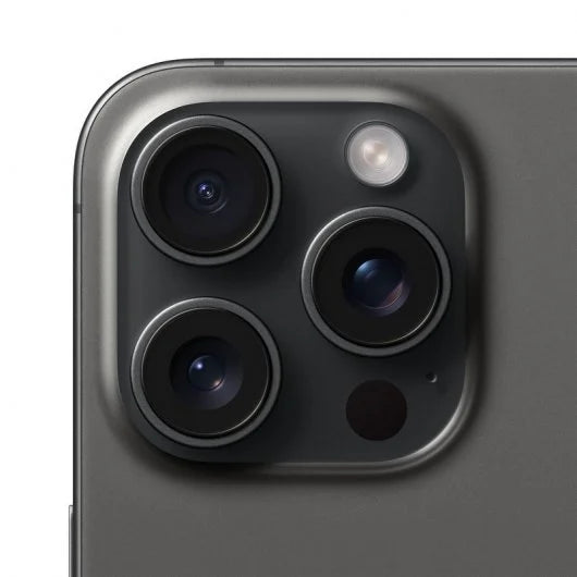 Close-up of a smartphone camera module on a gray background