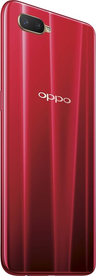 Red OPPO smartphone showing the glossy back panel with a vertical fingerprint sensor design and the white OPPO logo in the center.