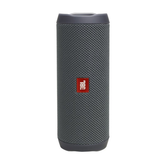 A JBL portable Bluetooth speaker in dark gray with a textured fabric grille and a red JBL logo on the front, set against a plain white background.