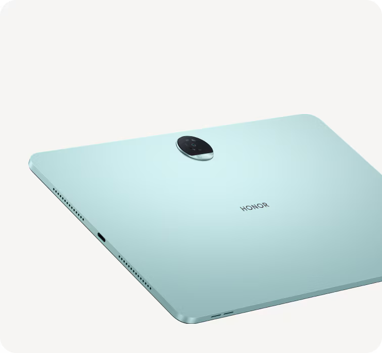 A light mint green Honor tablet shown from the back, featuring a circular camera lens cutout and the HONOR logo, set against a clean off-white background.